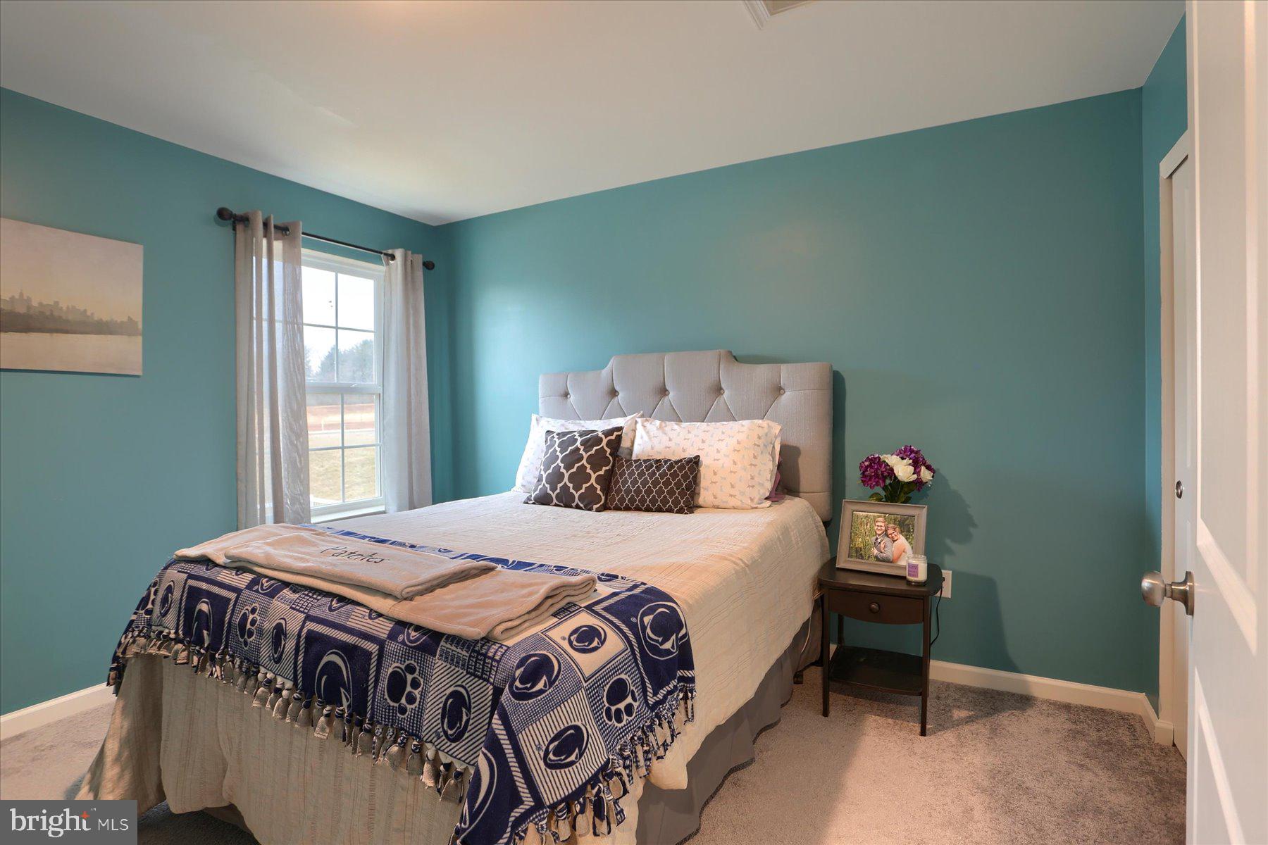 3480 Winter Drive Dover, PA 17315 - Photo 22 of 39 a bedroom with a bed next to a window