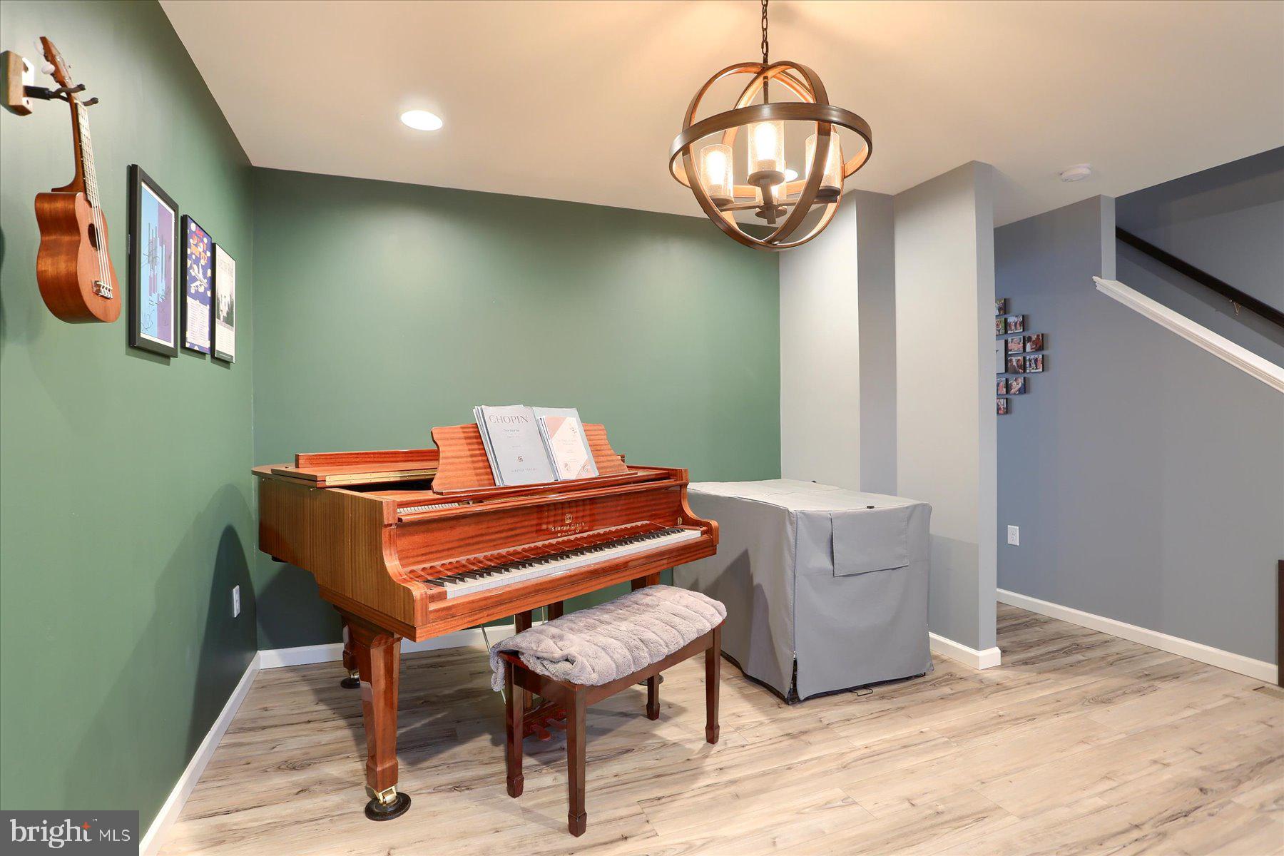 3480 Winter Drive Dover, PA 17315 - Photo 5 of 39 a bedroom with a bed and a chandelier