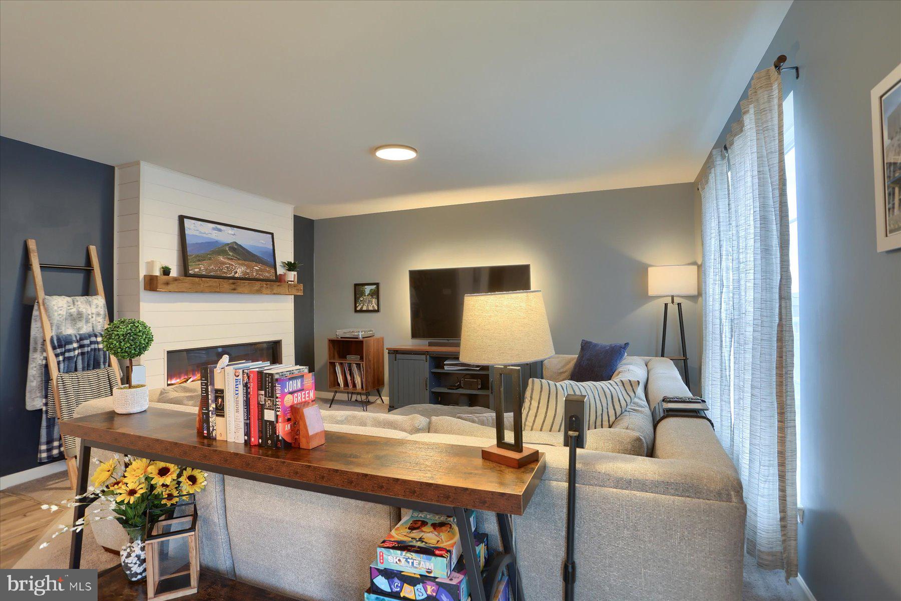 3480 Winter Drive Dover, PA 17315 - Photo 9 of 39 a living room with furniture and a flat screen tv