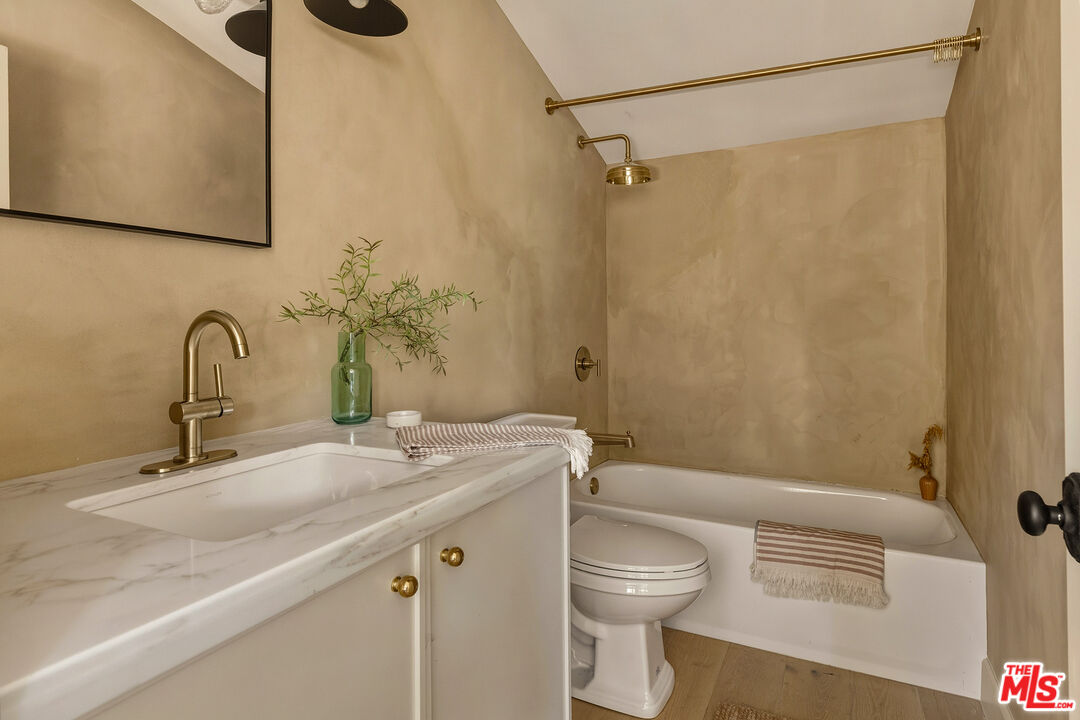585 Mountain View Street Altadena, CA 91001 - Photo 28 of 31 a bathroom with a sink a toilet and shower