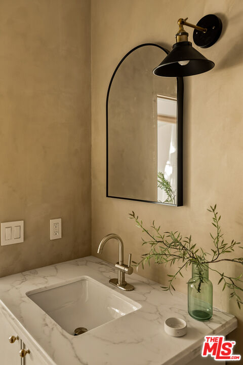 585 Mountain View Street Altadena, CA 91001 - Photo 29 of 31 a bathroom with a sink and a mirror