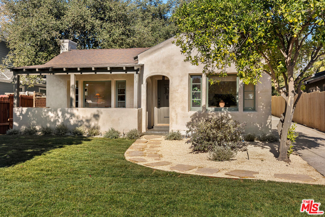 585 Mountain View Street Altadena, CA 91001 - Photo 4 of 31 a front view of a house with garden