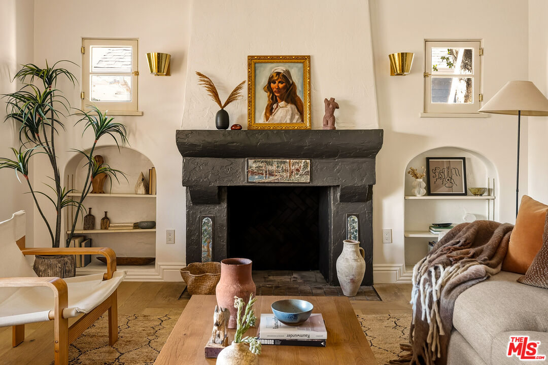 585 Mountain View Street Altadena, CA 91001 - Photo 6 of 31 a living room with furniture and a fireplace