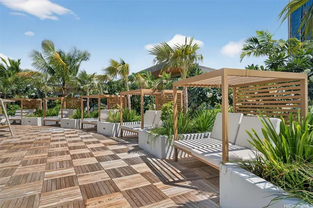 a view of a chairs and table on the patio