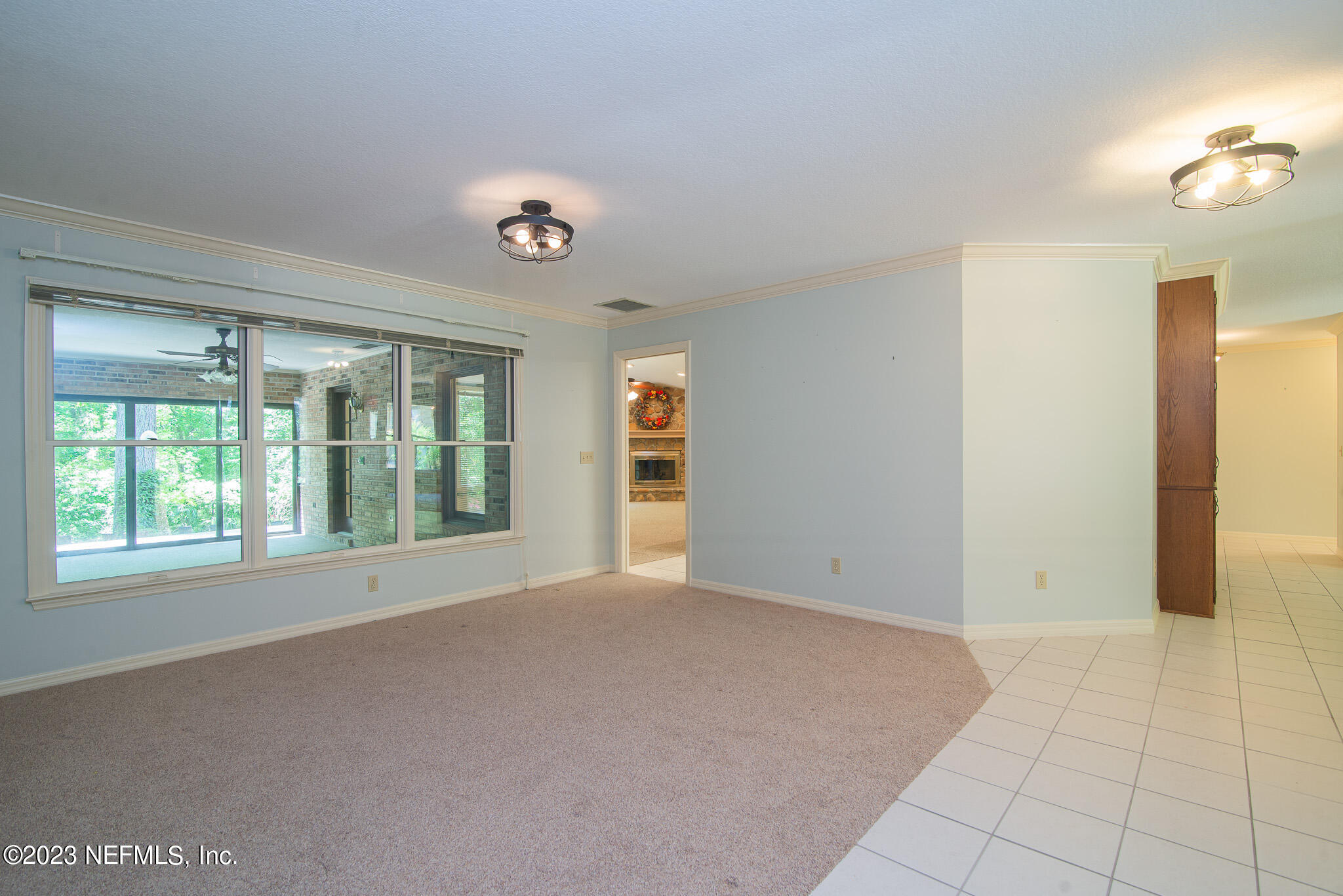 4233 Wicks Branch Road St. Augustine, FL 32086 - Photo 12 of 45 an empty room with windows