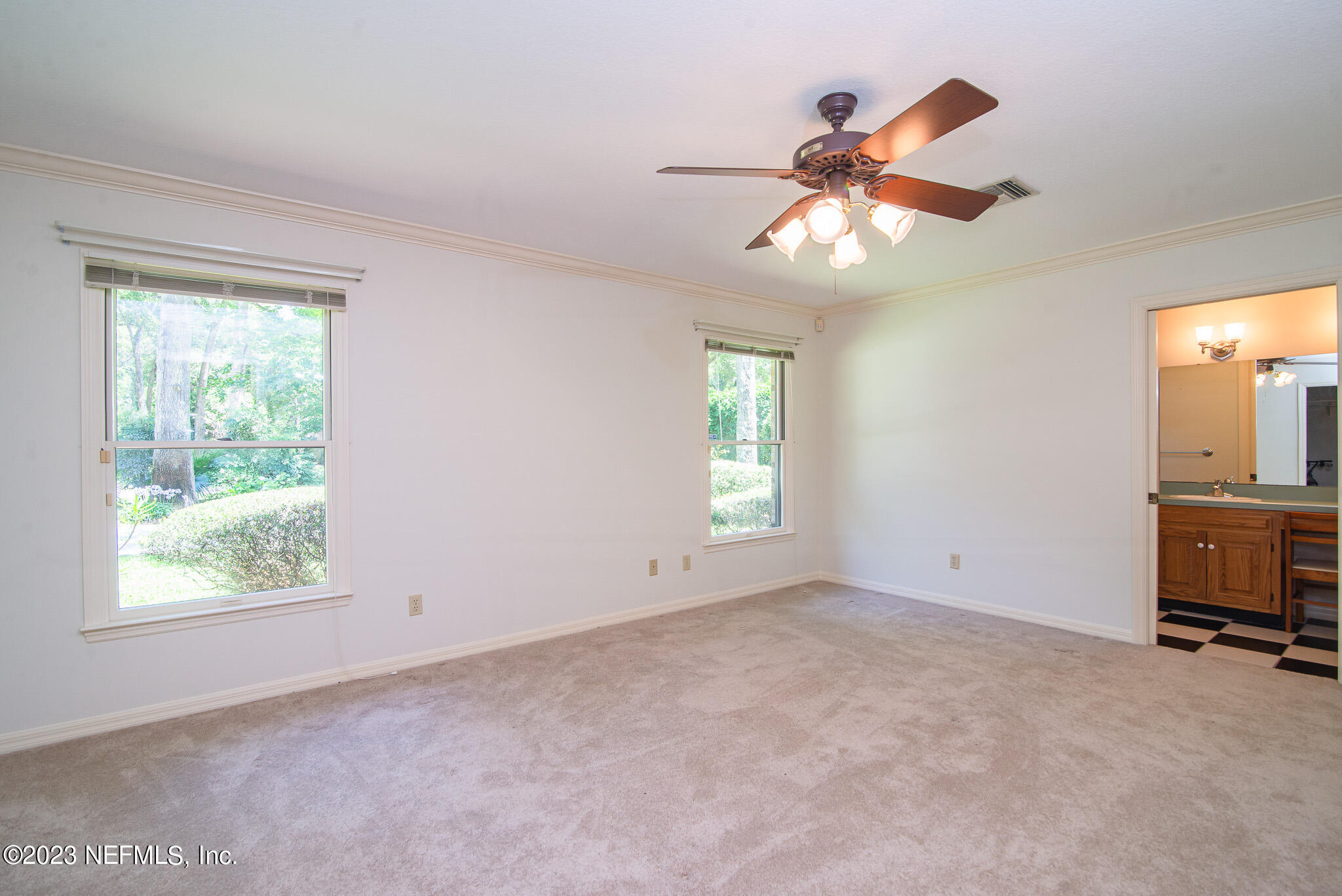 4233 Wicks Branch Road St. Augustine, FL 32086 - Photo 20 of 45 a view of an empty room with a window