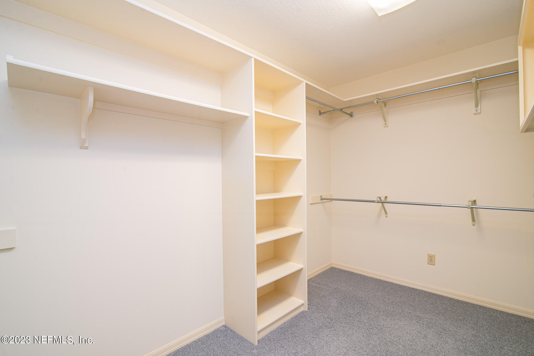 4233 Wicks Branch Road St. Augustine, FL 32086 - Photo 25 of 45 a view of an empty walk in closet