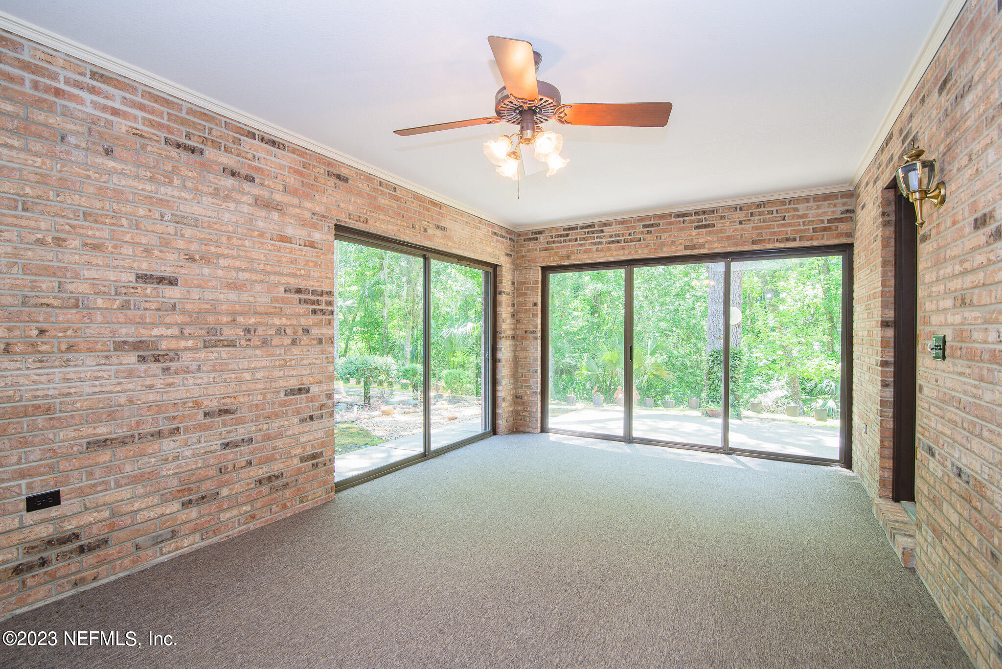 4233 Wicks Branch Road St. Augustine, FL 32086 - Photo 35 of 45 a view of an empty room with a window