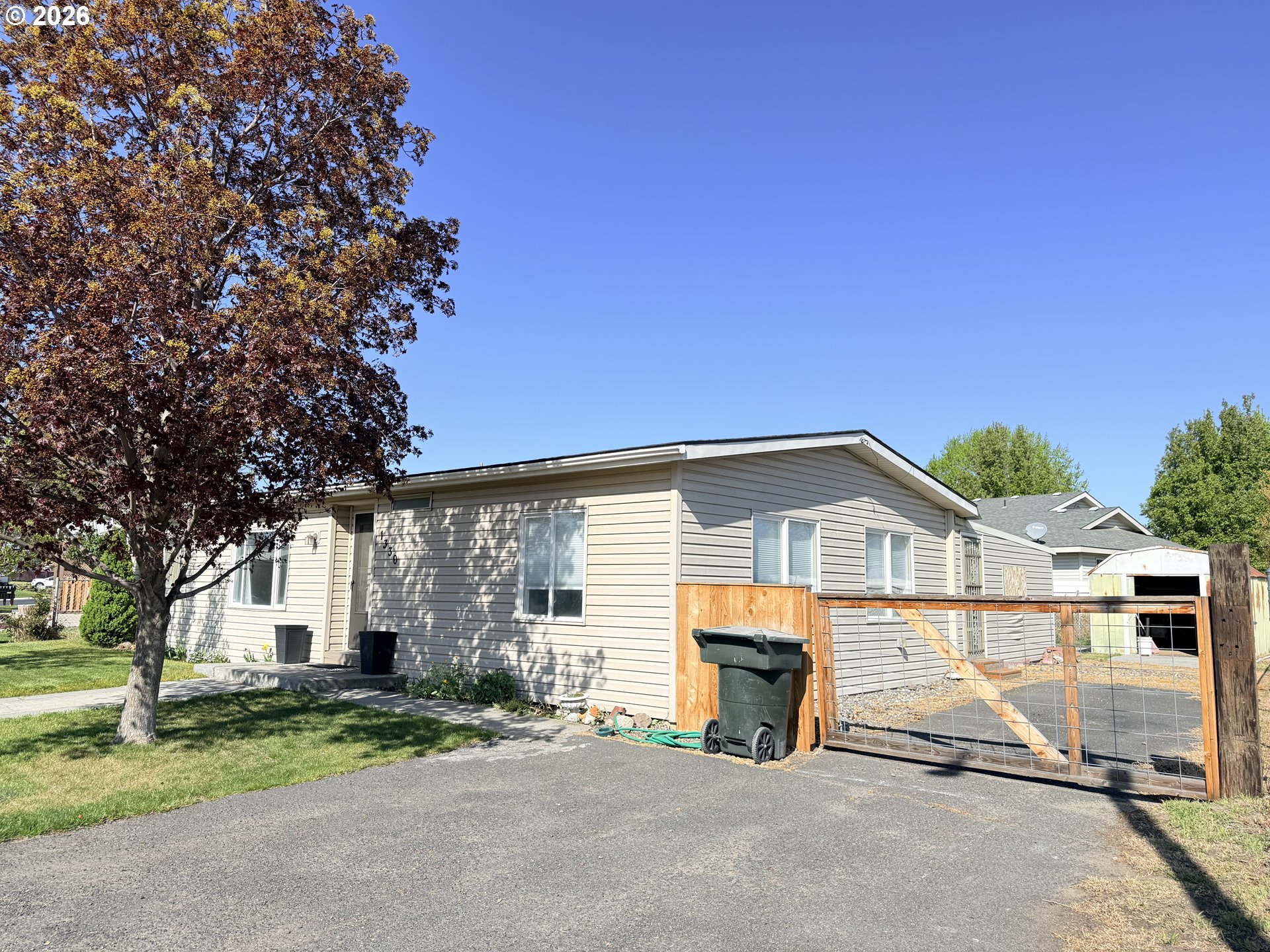 1330 West Sunland Avenue Hermiston, OR 97838 - Photo 23 of 23 a view of a house with a patio