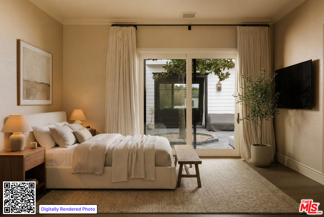 24155 Hidden Ridge Road Hidden Hills, CA 91302 - Photo 13 of 23 a bedroom with a bed and large window