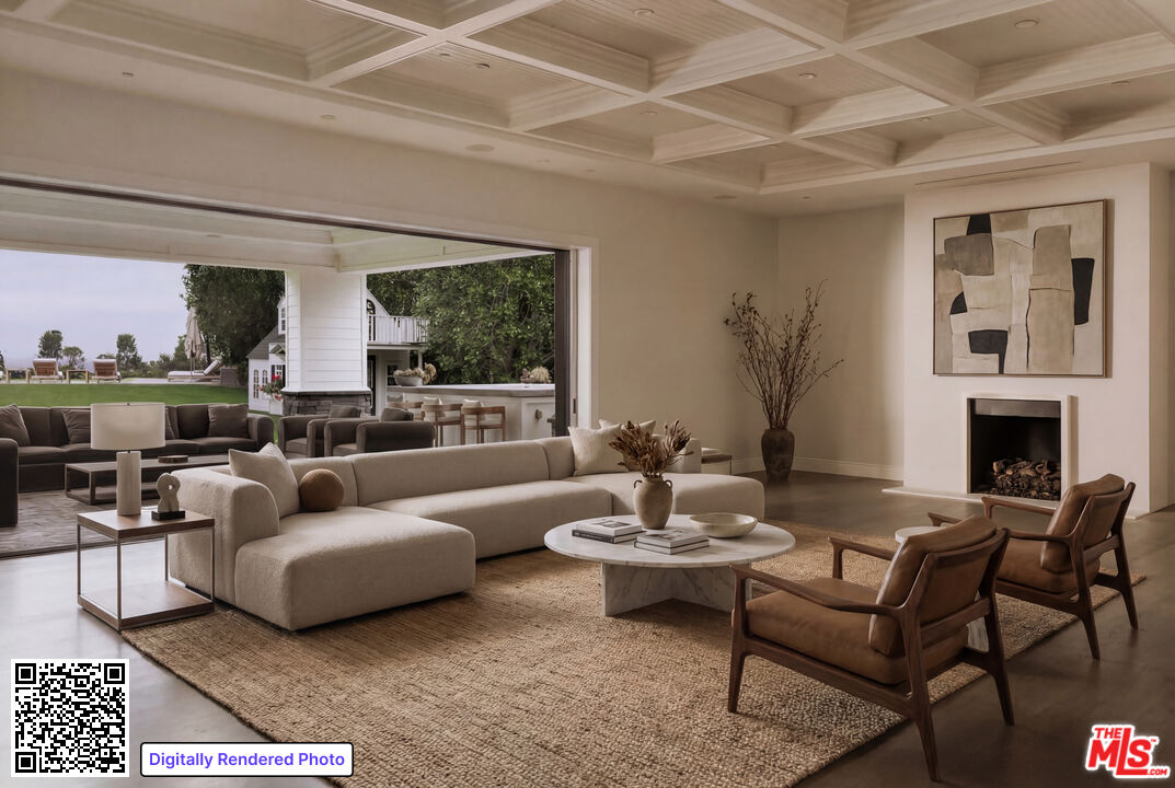 24155 Hidden Ridge Road Hidden Hills, CA 91302 - Photo 5 of 23 a living room with furniture and a fireplace