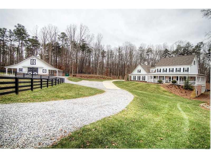 353 Tellico Road Canton, GA 30115 - Photo 1 of 1 Exterior Front. Amazing custom built 6+/- Acre gated equestrian estate with 4 stall barn & 4 paddocks