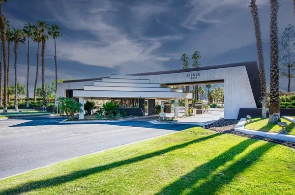 a sign board with garden