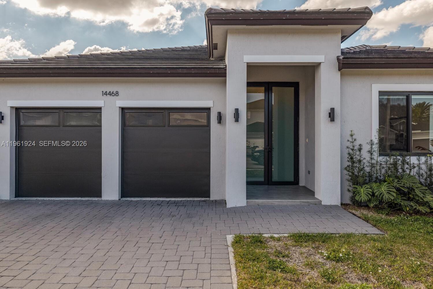 14468 Southwest 16th Street Miami, FL 33175 - Photo 43 of 46 a front view of a house