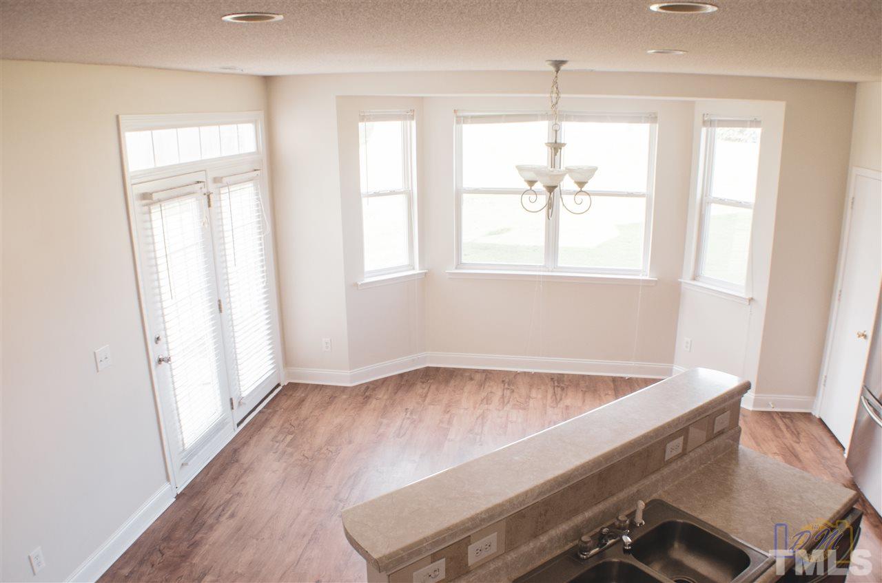 2636 Quarry Ridge Lane Raleigh, NC 27610 - Photo 5 of 12 an empty room with windows