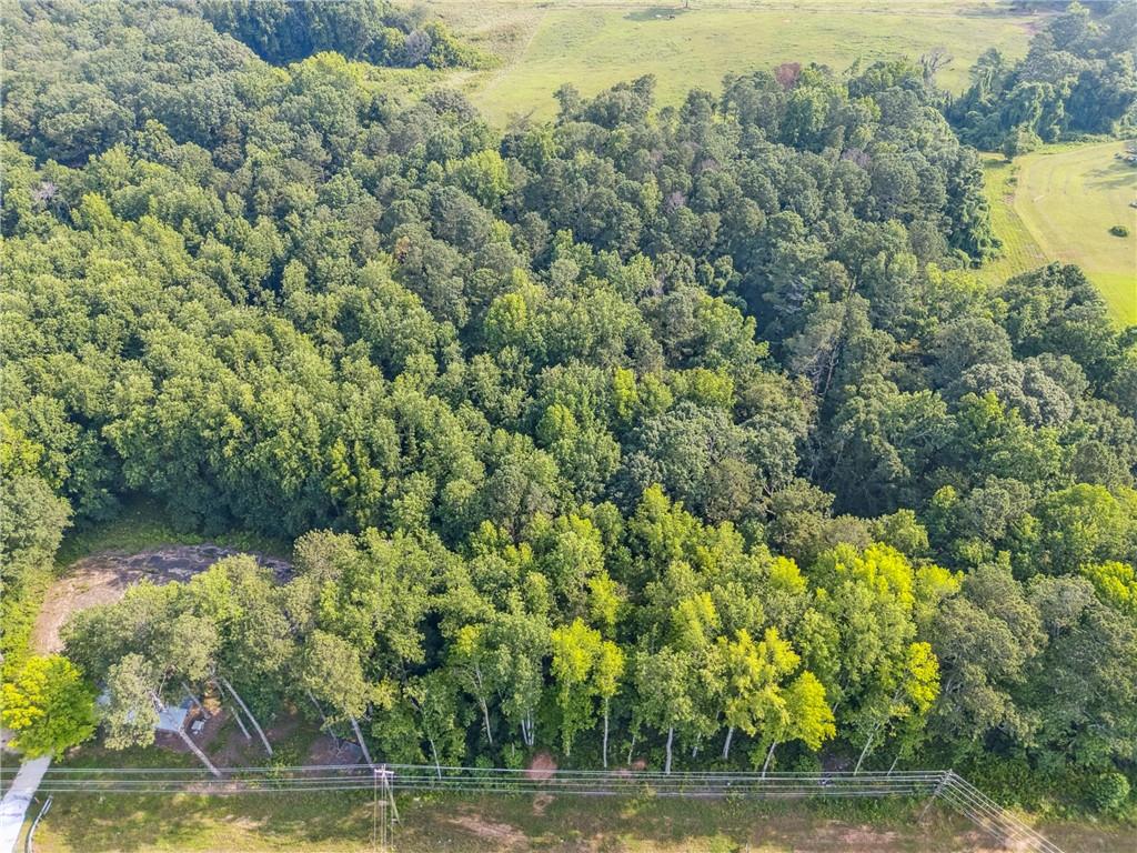 0 Cumming Highway Canton, GA 30115 - Photo 7 of 9 a view of a lake with a yard