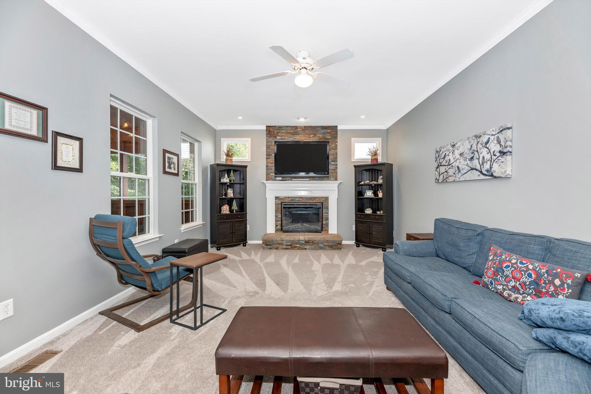 6416 Spring Forest Road Frederick, MD 21701 - Photo 12 of 49 Stunning family room with stone fireplace.