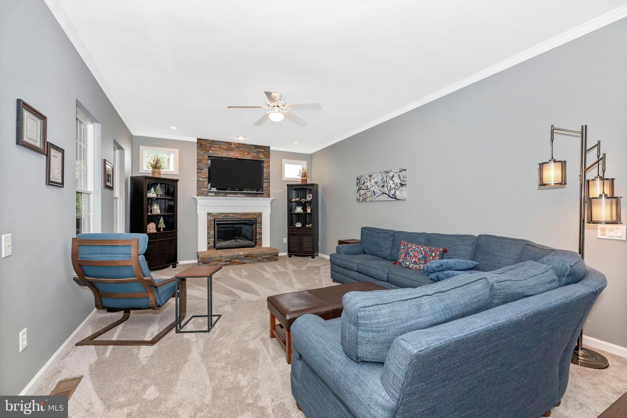 6416 Spring Forest Road Frederick, MD 21701 - Photo 13 of 49 Stunning family room with stone fireplace.