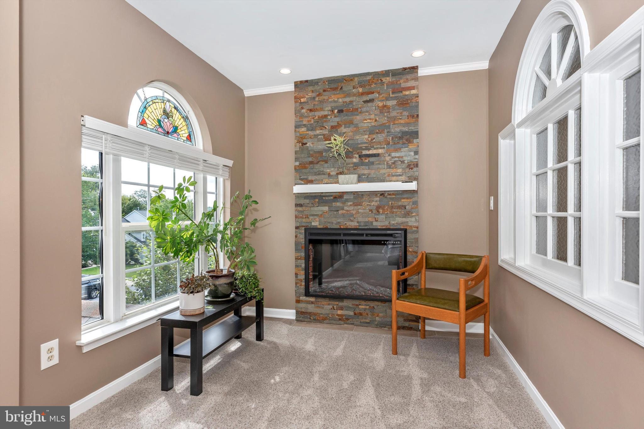 6416 Spring Forest Road Frederick, MD 21701 - Photo 18 of 49 Primary bedroom sitting area - electric fireplace.