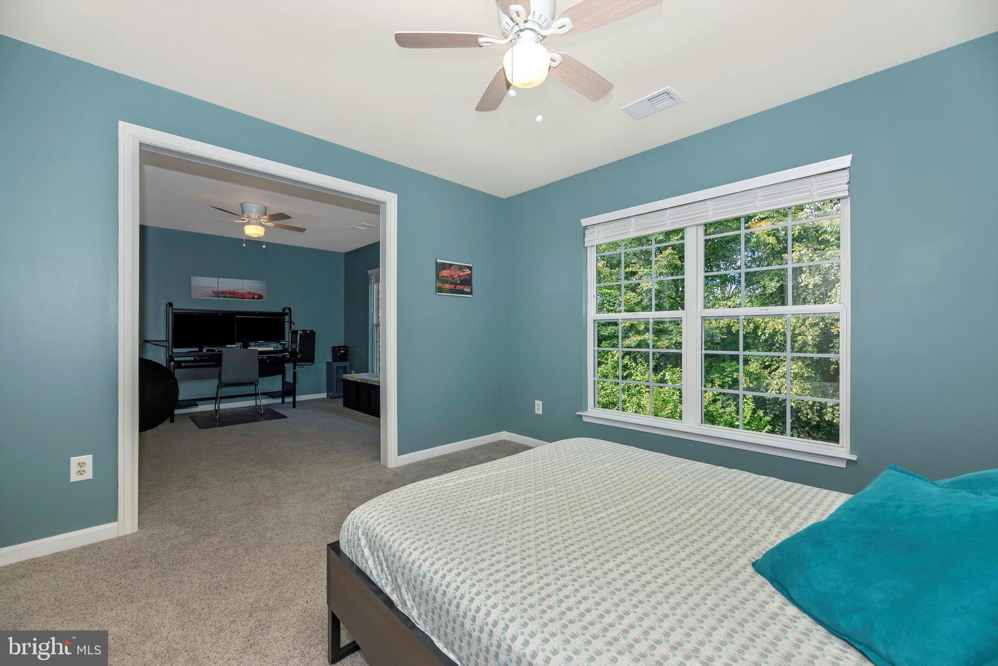 6416 Spring Forest Road Frederick, MD 21701 - Photo 22 of 49 Third upper level bedroom opens to fourth bedroom.
