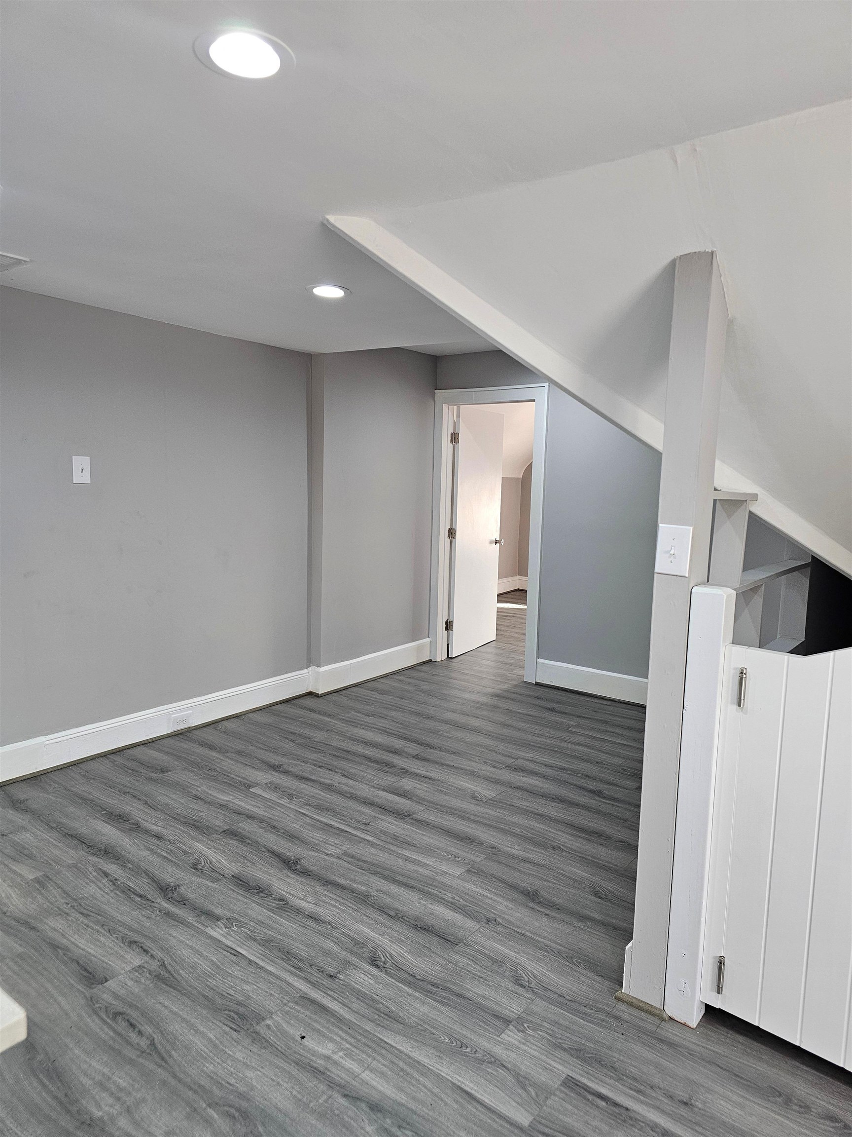 127-129 West 3rd Street, Unit 3 Bayonne, NJ 07002 - Photo 3 of 10 a view of hallway with wooden floor