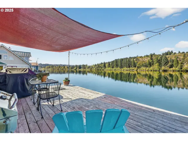 a view of a patio with swimming pool