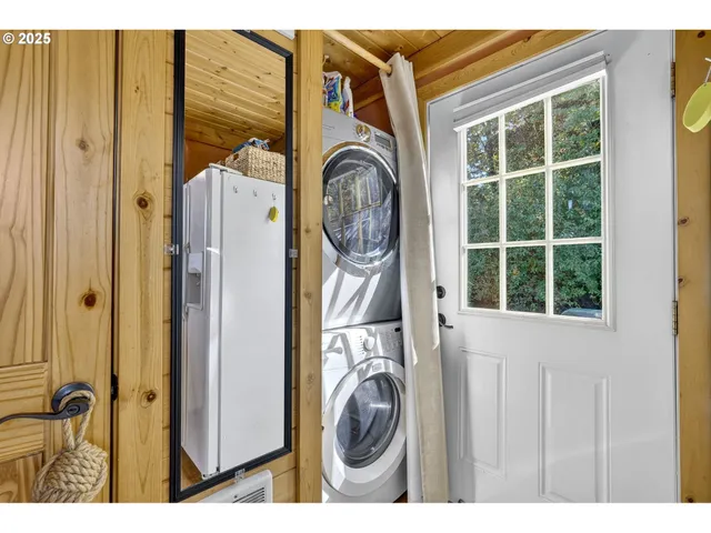a view of a chairs and table in patio