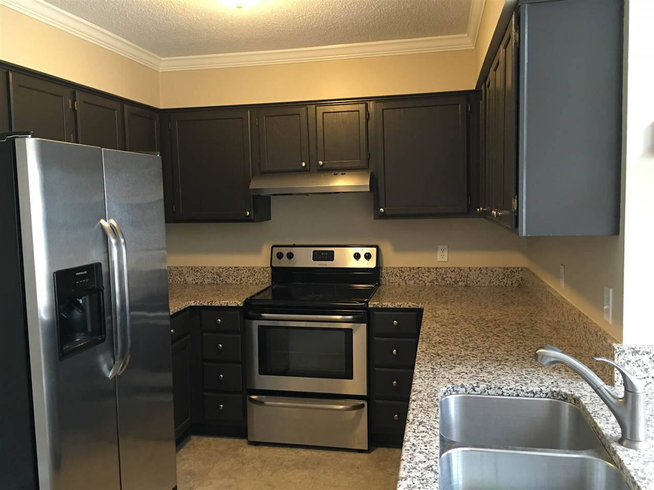 2 Hitching Rack Court Durham, NC 27713 - Photo 8 of 23 Granite counters and stainless appliances. refrigerator remains. Kitchen