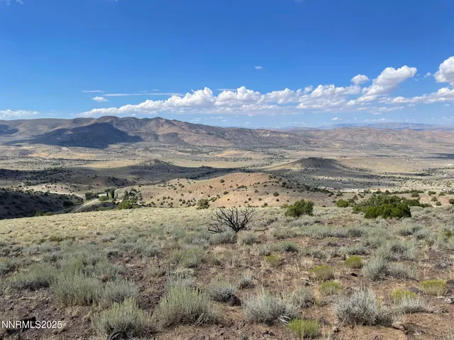 a view of a lake with a mountain