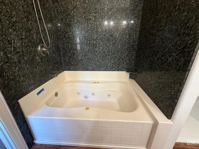 a bathroom with a bathtub