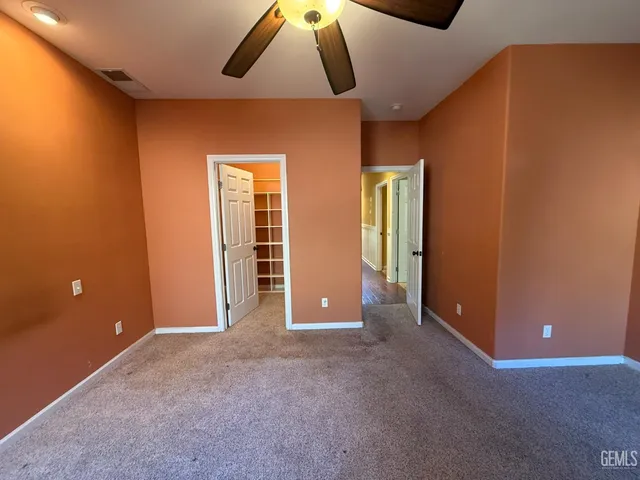 an empty room with a bathroom