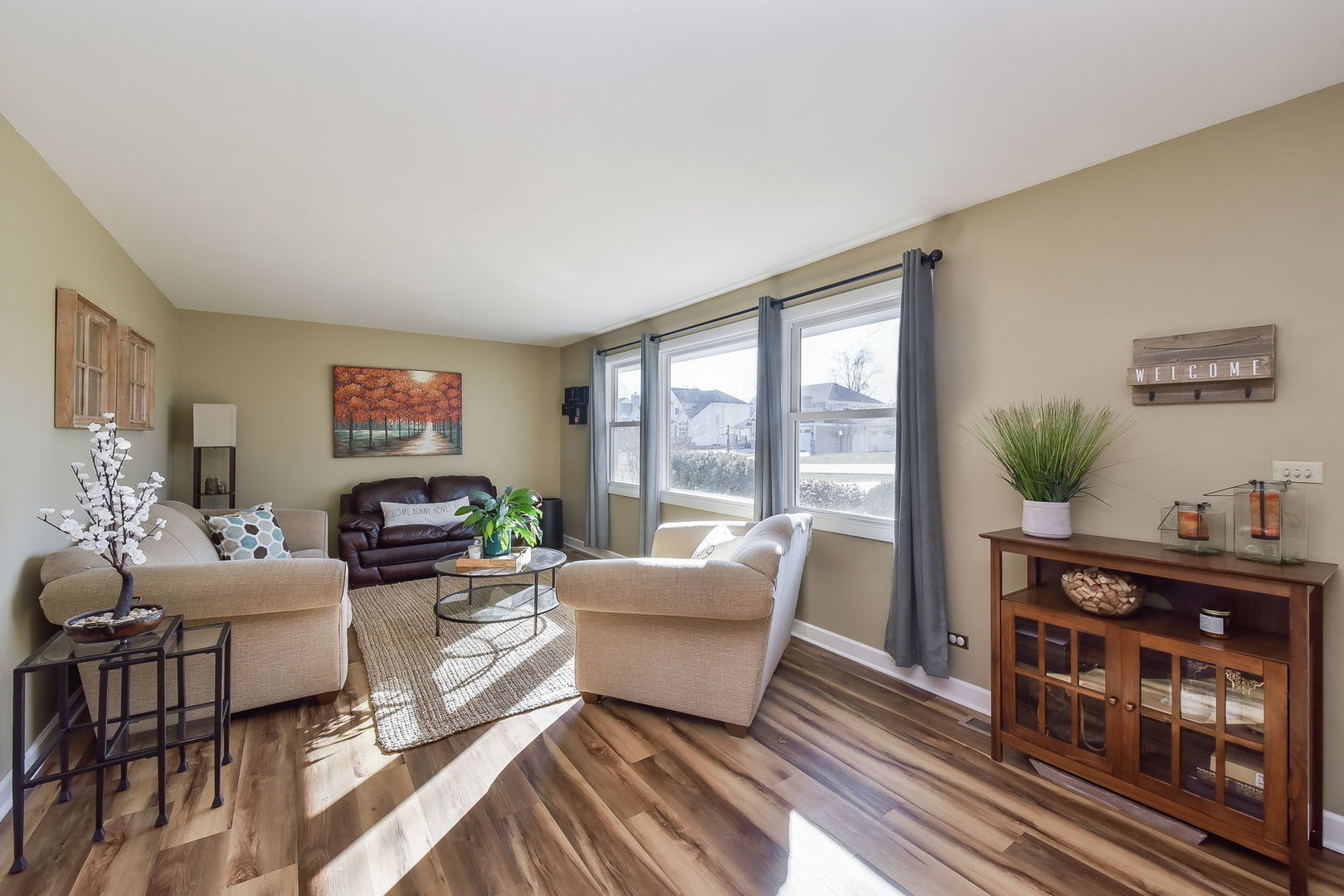 509 Turf Lane Wheaton, IL 60187 - Photo 2 of 16 a living room with furniture and a flat screen tv