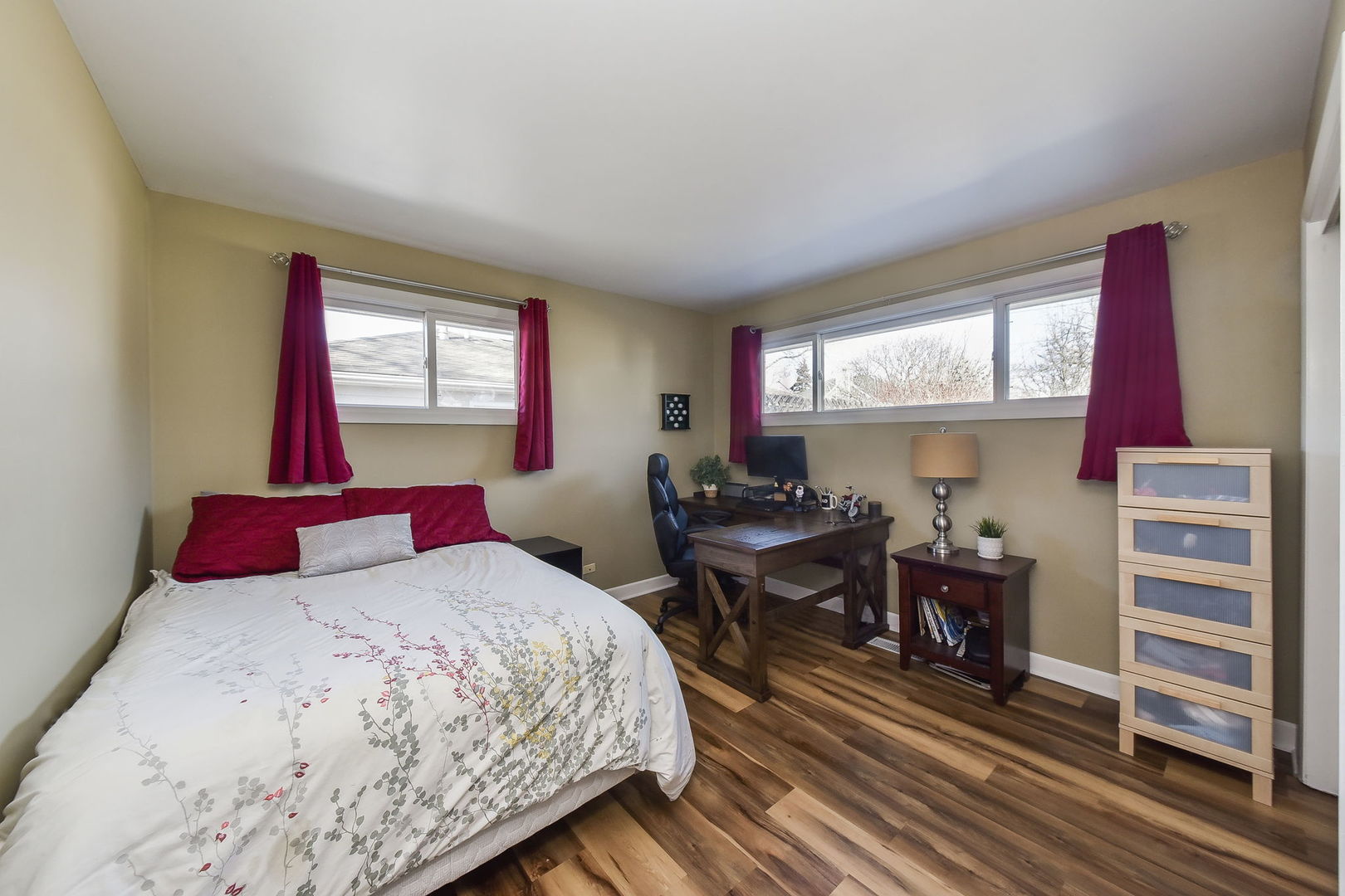 509 Turf Lane Wheaton, IL 60187 - Photo 10 of 16 a bedroom with a bed and wooden floor