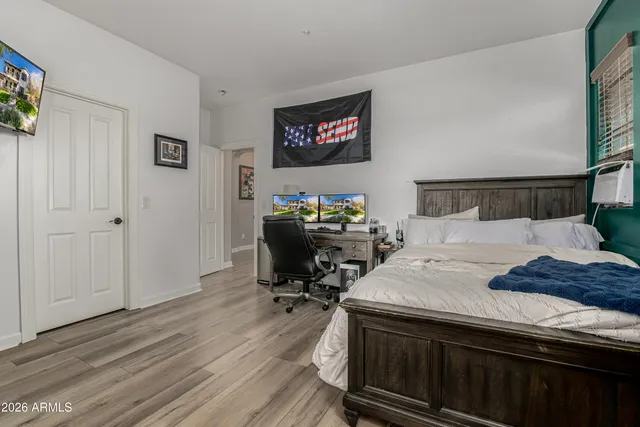 a view of a chairs and table in the balcony