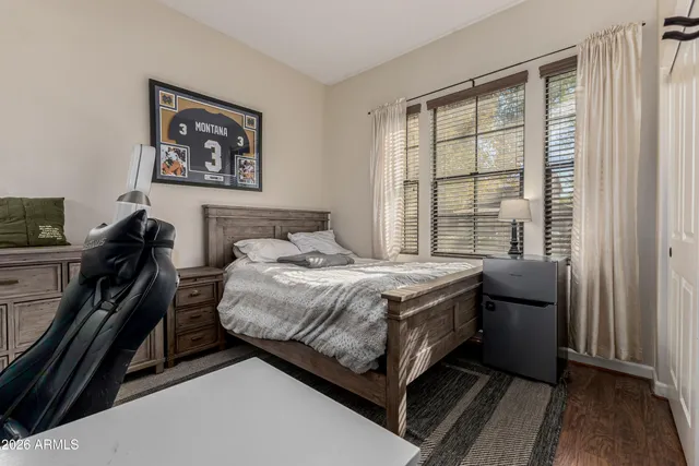 a front view of a house with a yard and a garage