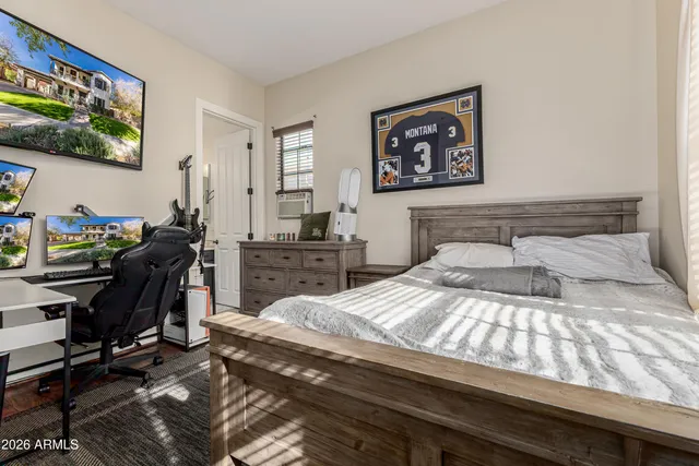 a front view of a building with tree s