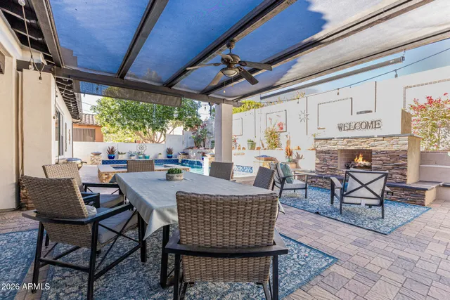 a view of a grassy field with an trees