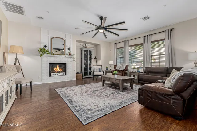 a living room with furniture and a rug