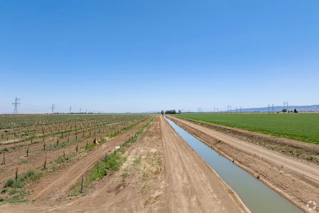 a view of a lake with beach