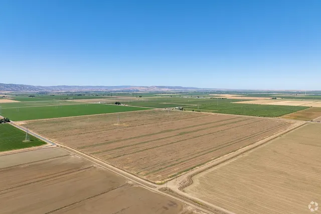 a view of an outdoor space and tennis court