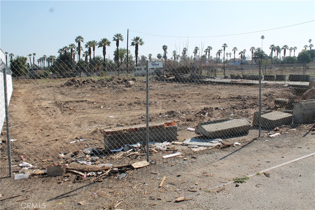 a view of a town with trees in the background