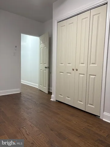 a view of a livingroom with wooden floor