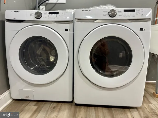 a utility room with dryer and washer