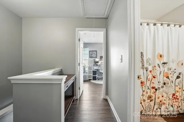 a kitchen with a stove and a refrigerator