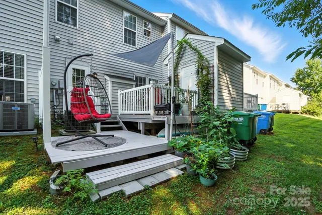 a backyard of a house with seating space
