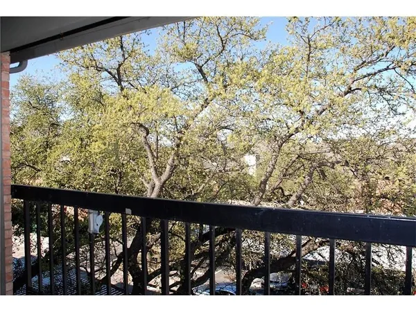 a view of a street from a balcony