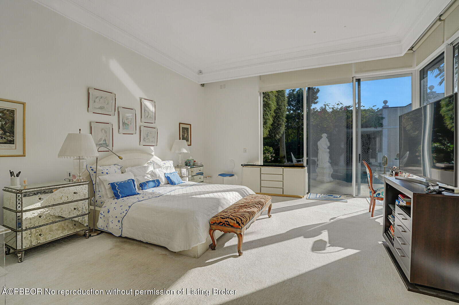 220 Wells Road Palm Beach, FL 33480 - Photo 17 of 30 a bedroom with a bed and a large window