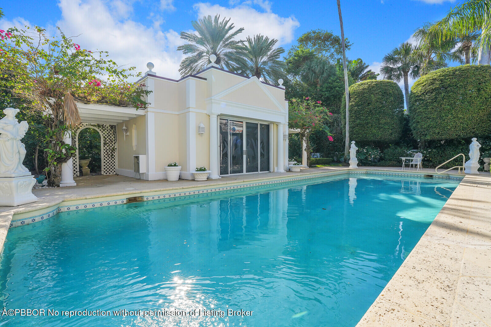 220 Wells Road Palm Beach, FL 33480 - Photo 27 of 30 a view of a house with a swimming pool
