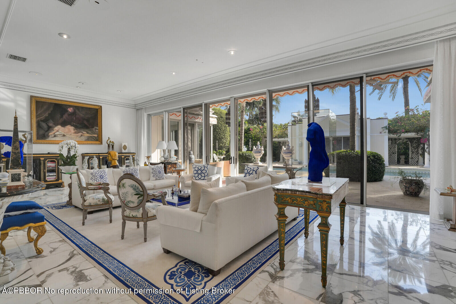 220 Wells Road Palm Beach, FL 33480 - Photo 8 of 30 a living room with furniture large windows and wooden floor
