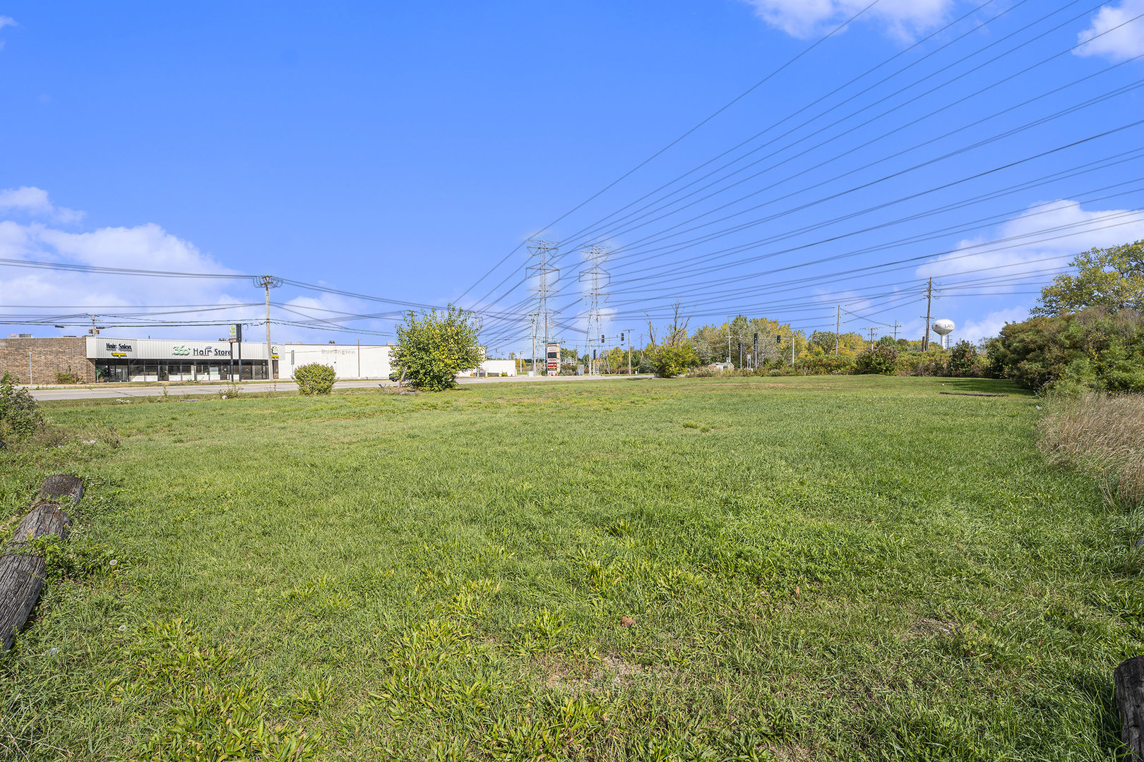 a view of a big yard with an outdoor space and seating